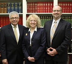 Photo of attorneys Frank S. Gaudio, Janice Davis Miller and Michael E. McMahon